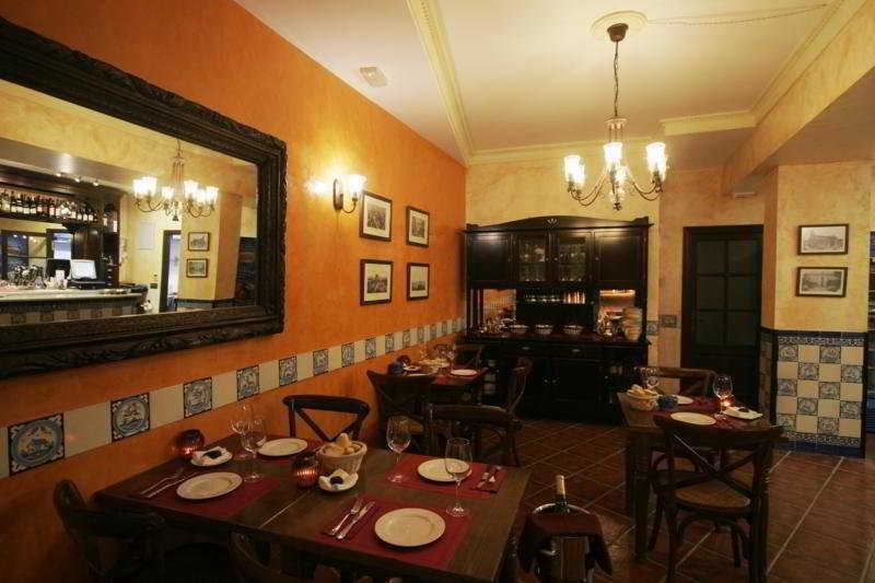 אל פוארטו דה סנטה מריה Casa Palacio De Los Leones מסעדה תמונה